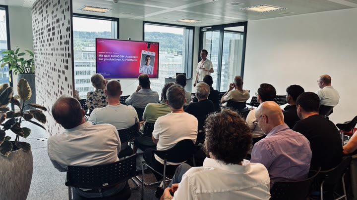 Max Kirst presenting the CANCOM Assistant to a full audience